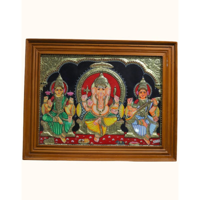 Framed Tanjore Painting of Lord Ganesha, Goddess Lakshmi, and Goddess Saraswati Framed Tanjore Painting of Lord Ganesha, Goddess Lakshmi, and Goddess Saraswati